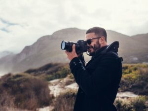 creative business owner photographer working outdoors managing finances