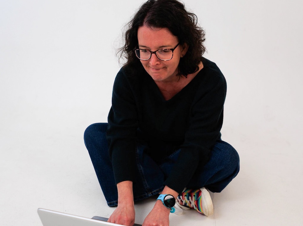 Sarah Hands of SJ Accountancy reviewing business finances on her laptop